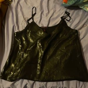 Top purchased yet never worn by owner. Still in perfect condition!